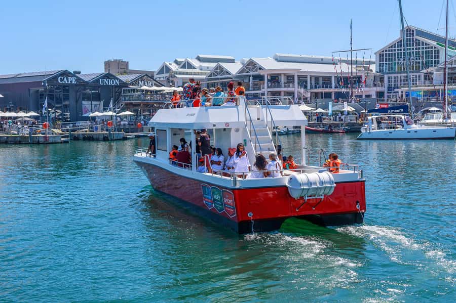 30min V&A Waterfront Harbour Cruise Cape Town - Boarding Une Belle Vie, a 47-foot double-decker catamaran