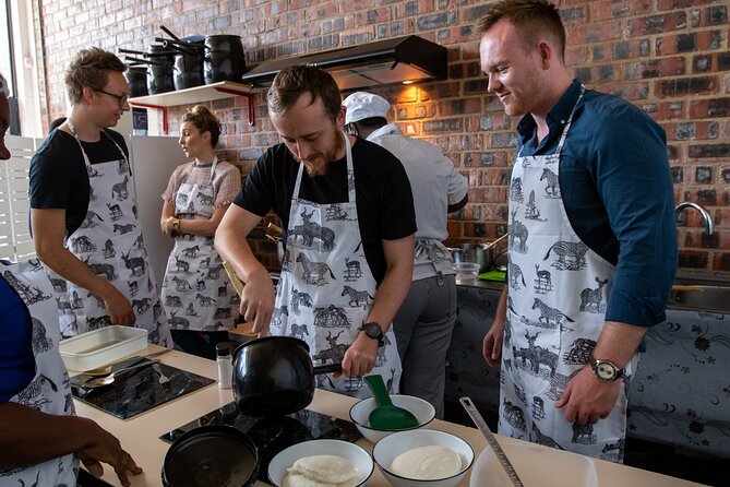 Authentic African Cuisine Cooking Experience - Florence turns the cooking into a shared task