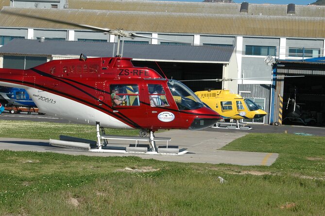 Camps Bay and Hout Bay Helicopter Tour from Cape Town - A toast at the Waterfront, with one detail to confirm