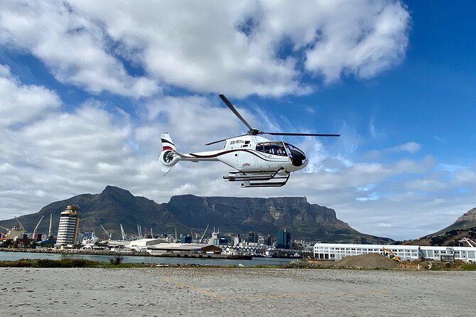 Cape Town: 25min Helicopter Flight with Complimentary Boat Cruise - Table Mountain gets the opening scene