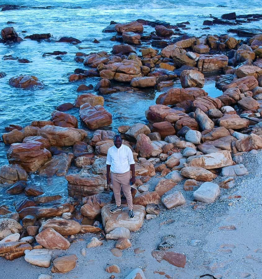 Cape Town: Cape of Good Hope & Penguins Full-Day Guided Tour - Camps Bay and Maiden’s Cove start the day