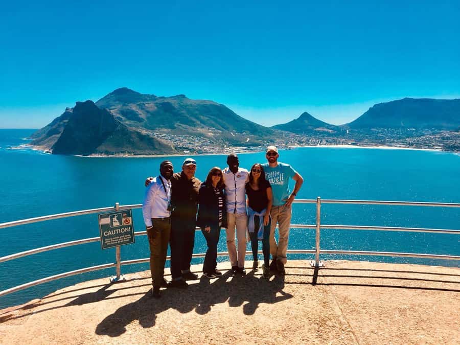 Cape Town: Table Mountain, Penguins & Cape Point Shared Tour - The guide and shared-vehicle experience