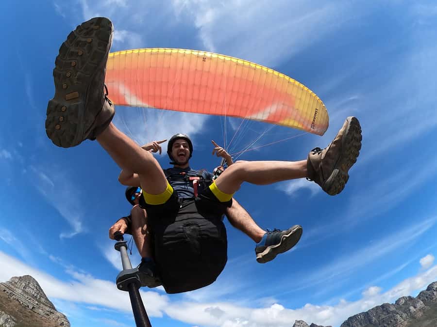 Cape Town: Tandem Paragliding Adventure - Landing near Sea Point and returning uphill