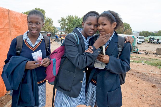 Contrast Tour Including Sandton, Alexandra, Johannesburg and Soweto - Entering Alexandra and visiting two shanty homes