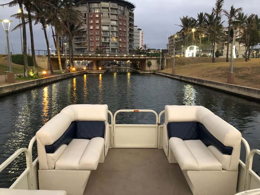 Durban Point Waterfront: Luxury Canal Boat Cruise - Buildings, harbour views, and local stories