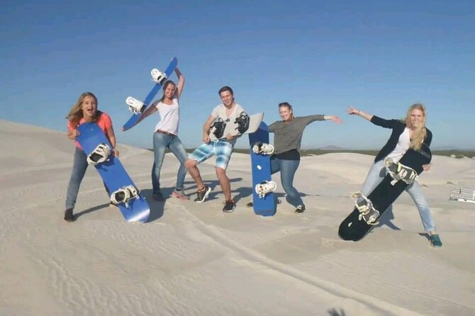 Explore Atlantis Sand Dunes with a 1hour 30mins sandboarding tour - Learning to sandboard in a short briefing