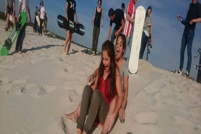 Explore Atlantis Sand Dunes with a 1hour 30mins sandboarding tour - Sitting or standing: choose your first ride