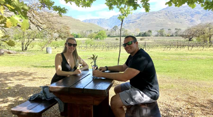 Franschhoek: E-Bike & Wine Tour (Shared Tour) - Riding through historic Franschhoek