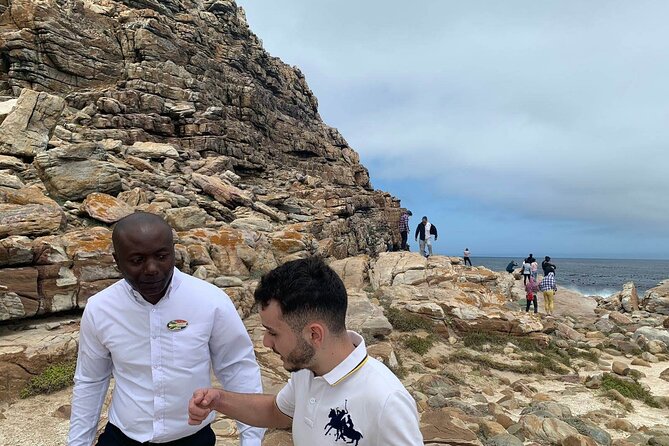 Full Day Cape of Good Hope & Boulder's Beach Penguin Private Tour - Camps Bay and Maiden’s Cove deliver the first big view