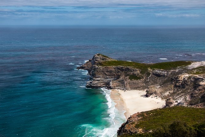 Full-Day Cape Peninsula Tour from Cape Town - Chapmans Peak, where the road becomes the attraction