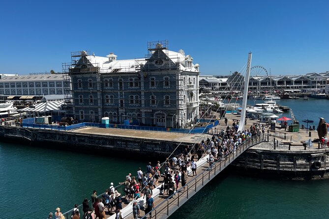 "Half-Day Robben Island Tour with Customizable Options Included - Entering Nelson Mandela’s prison cell