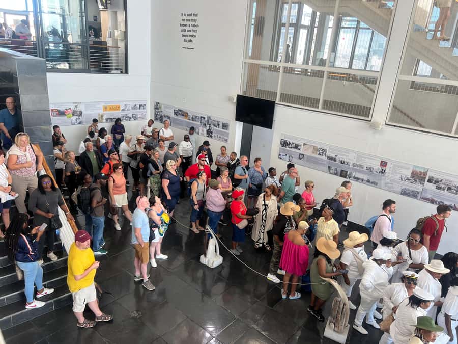 Half Day Tour to Robben Island with Pre-Booked Ticket - Standing outside Nelson Mandela’s cell