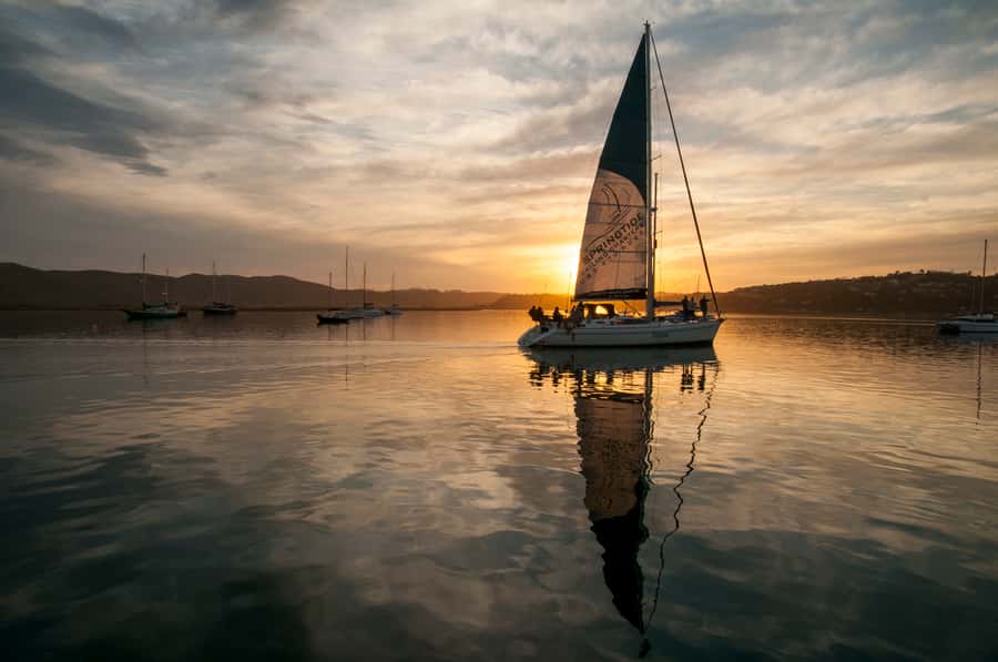 Knysna Sunset Sailing Cruise with Light Dinner and Wine - Setting sail from the Knysna Waterfront