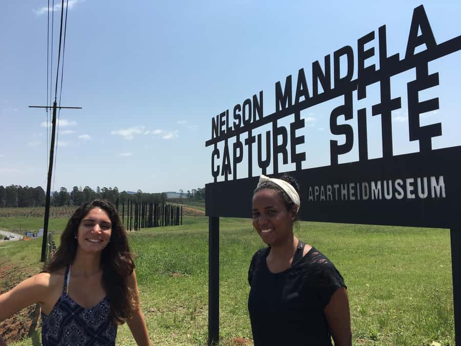 Mandela Capture Site Howick Falls & PheZulu Village Day Trip - Standing at Mandela Capture Site