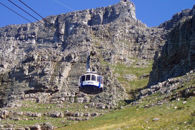 Table Mountain-Wines-Penguins-Cape Point All Inclusive Group Tour - Chapmans Peak supplies the postcard stop